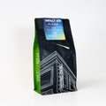 Coffee bag labeled 'Impact 470 Blend' with a blue label on a white background