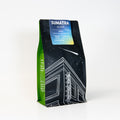 Coffee bag with 'Sumatra Aceh' label on a white background