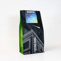 Coffee bag labeled 'Kenya Kichwa Tembo' with a black and green design on a white background