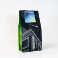 Coffee bag with 'Guatemala dark roast' label on a white background