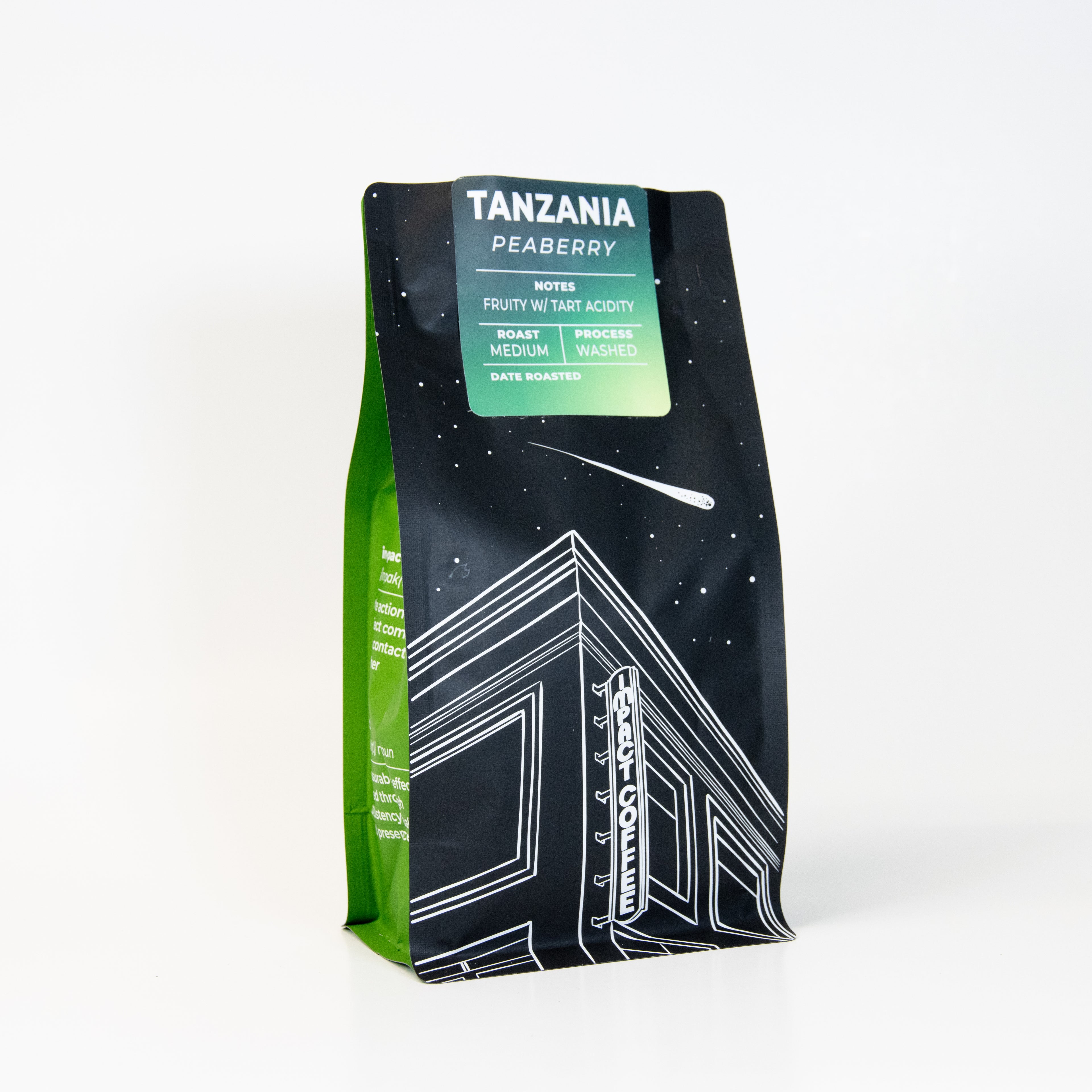 Coffee bag labeled 'Tanzania Peaberry' with green and black design on a white background